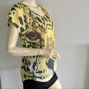 cap-sleeve knit top with animal print